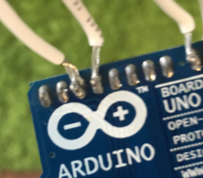 Arduino with bad solder job soldering wires directly to rear of board